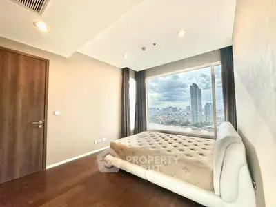 Luxurious bedroom with stunning city view and elegant decor