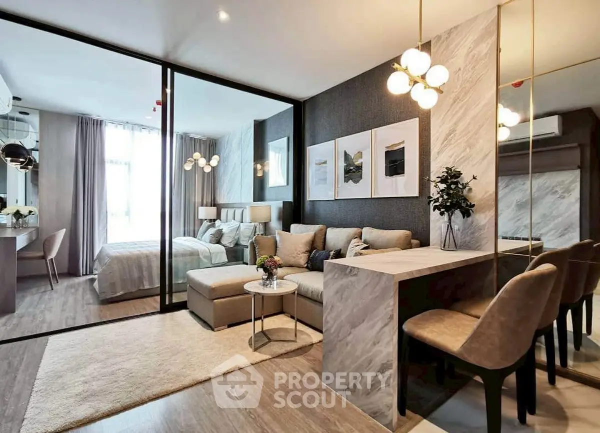 Modern open-plan living room with elegant decor and cozy seating area