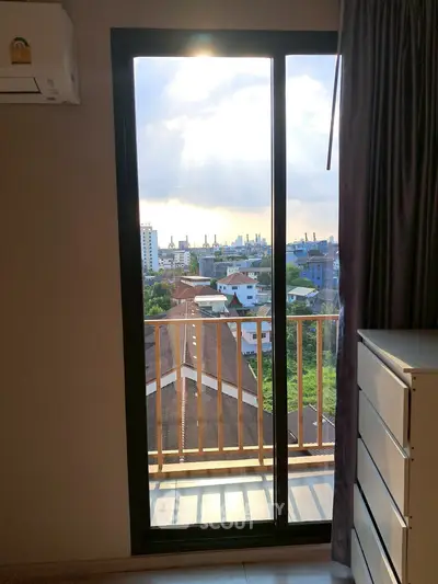 Bright apartment balcony with stunning city view and ample natural light