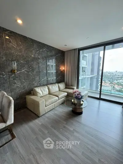 Luxurious living room with stunning city view and elegant marble wall