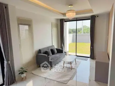 Modern living room with elegant decor and garden view