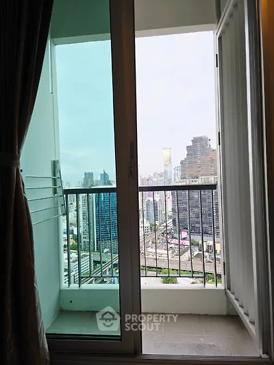 Stunning city view from a high-rise balcony, perfect for urban living enthusiasts.