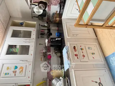 Charming kitchen with unique decor and ample storage space