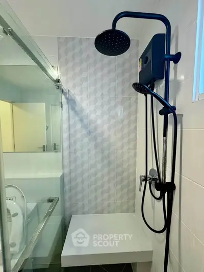 Modern bathroom with sleek shower design and stylish tiles