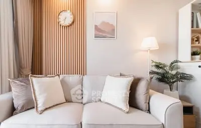 Elegant living room with cozy sofa and stylish decor