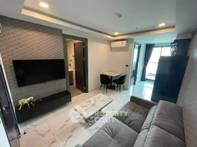 Modern living room with sleek furniture and stylish decor in a contemporary apartment.
