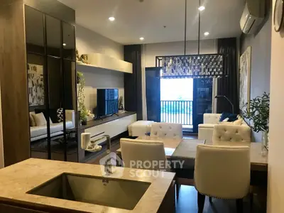 Modern living room with elegant decor and balcony view in luxury apartment