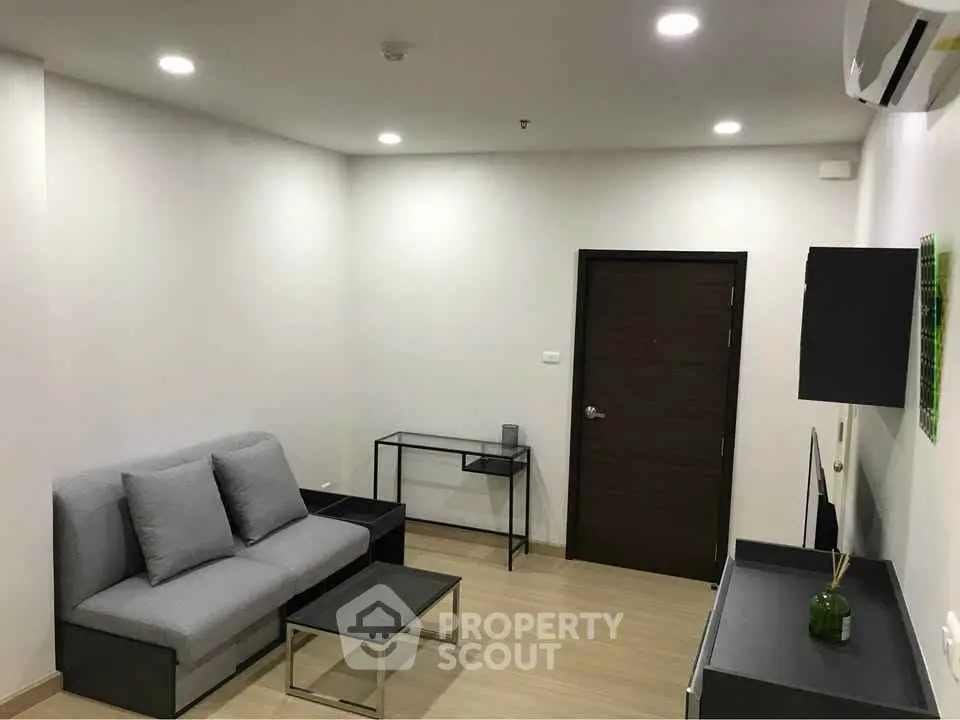 Modern living room with minimalist furniture and neutral tones