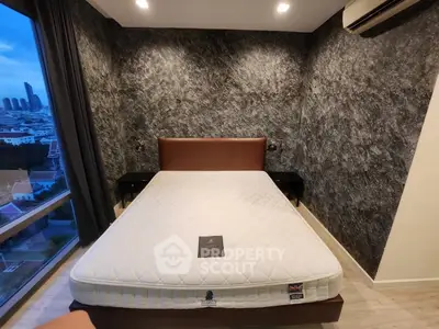 Modern bedroom with stylish textured wall and city view window