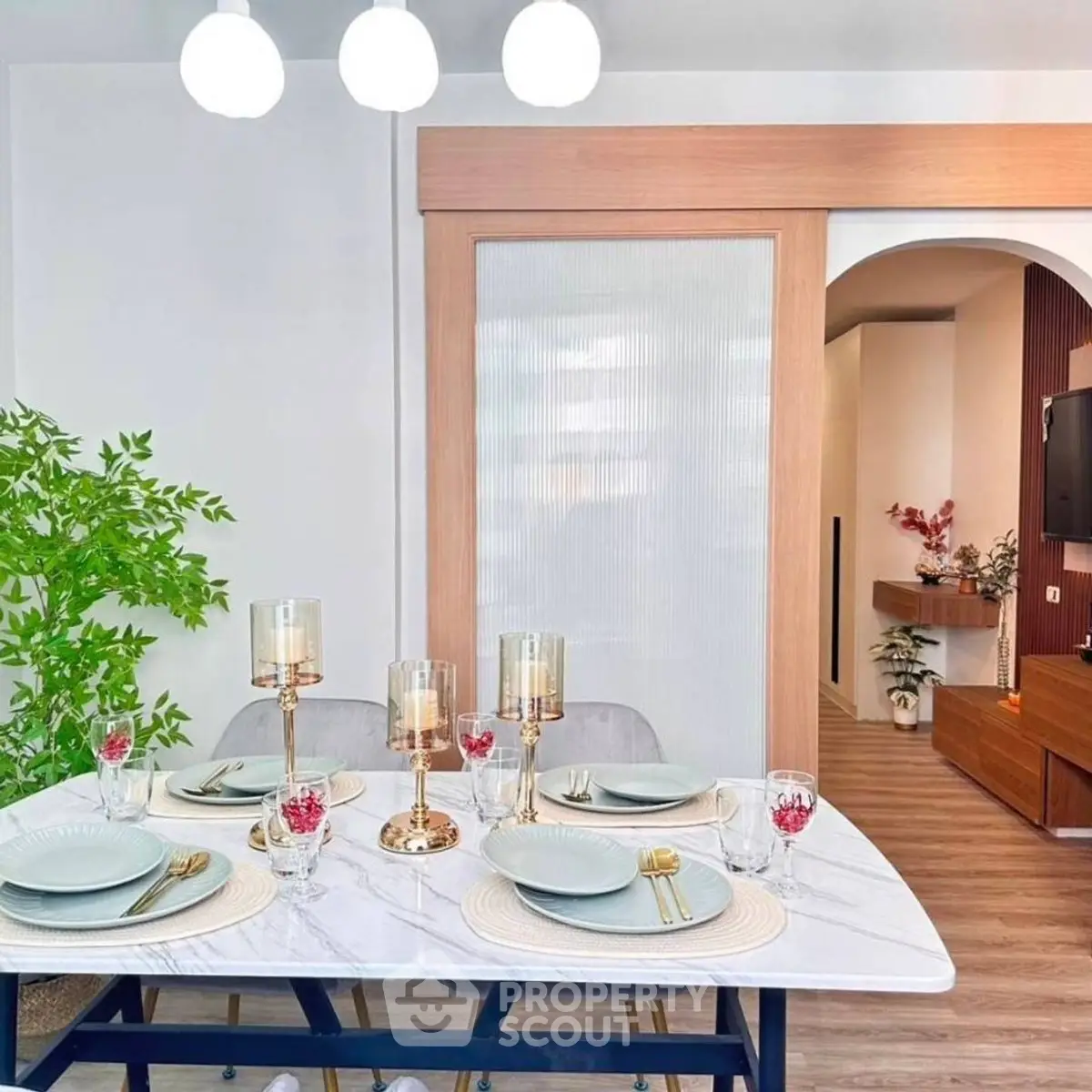 Elegant dining area with modern decor and stylish table setting