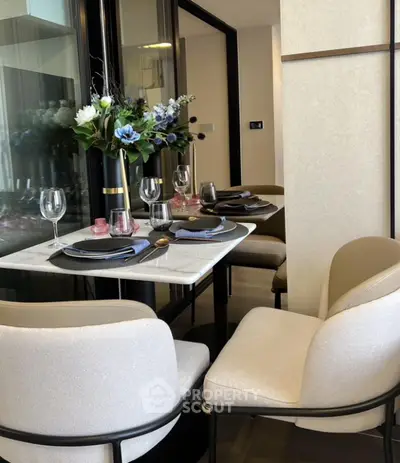 Elegant dining area with modern decor and stylish table setting