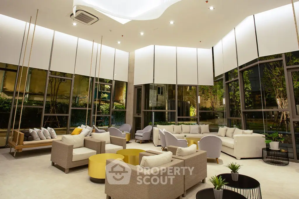 Luxurious modern living room with high ceilings and elegant furniture