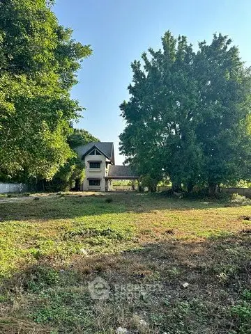 Charming countryside home surrounded by lush greenery and open space, perfect for tranquil living.