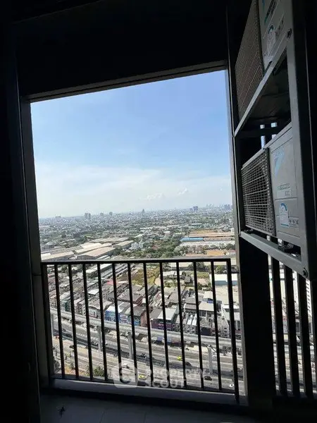 Stunning high-rise balcony view overlooking the cityscape, perfect for urban living.