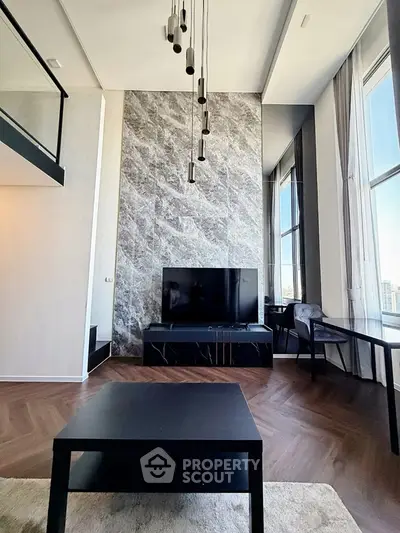 Luxurious modern living room with high ceilings and elegant decor