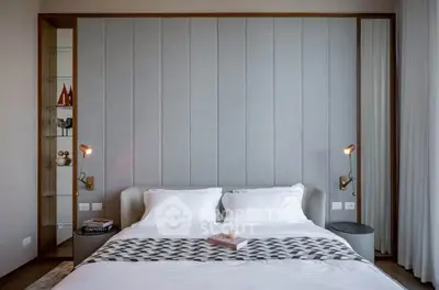 Luxurious bedroom with modern decor and elegant lighting