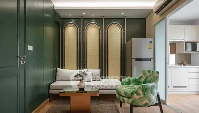 Stylish living room with modern decor and cozy seating area.