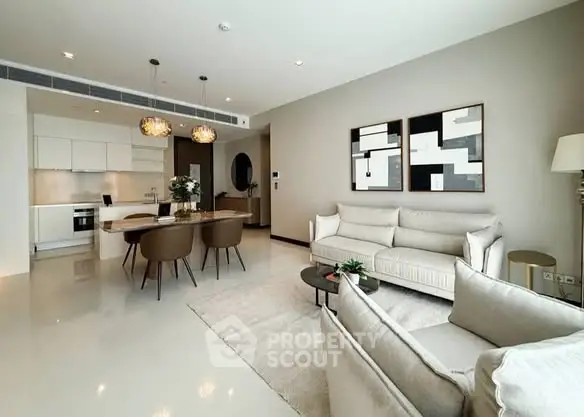 Modern open-plan living room with elegant dining area and stylish decor