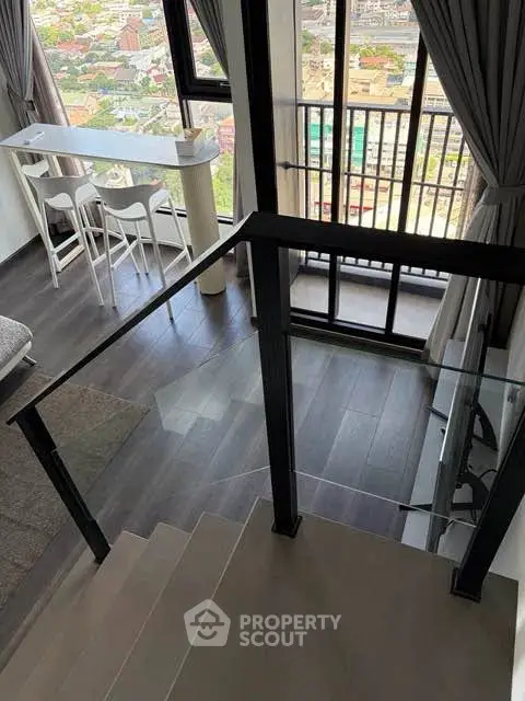 Modern duplex apartment with stunning city view and sleek interior design