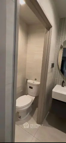 Modern bathroom with sleek design and compact layout