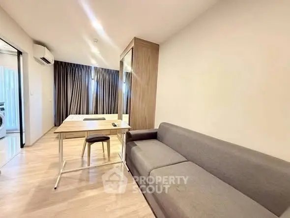 Modern living room with sleek furniture and natural light