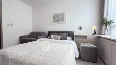 Cozy bedroom with modern decor and natural light