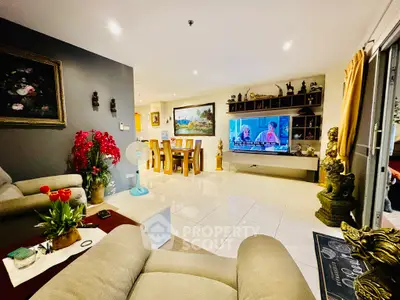 Spacious living room with elegant decor and modern entertainment setup