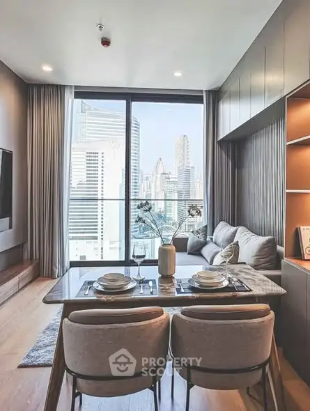 Modern living room with city view, stylish furniture, and elegant decor.