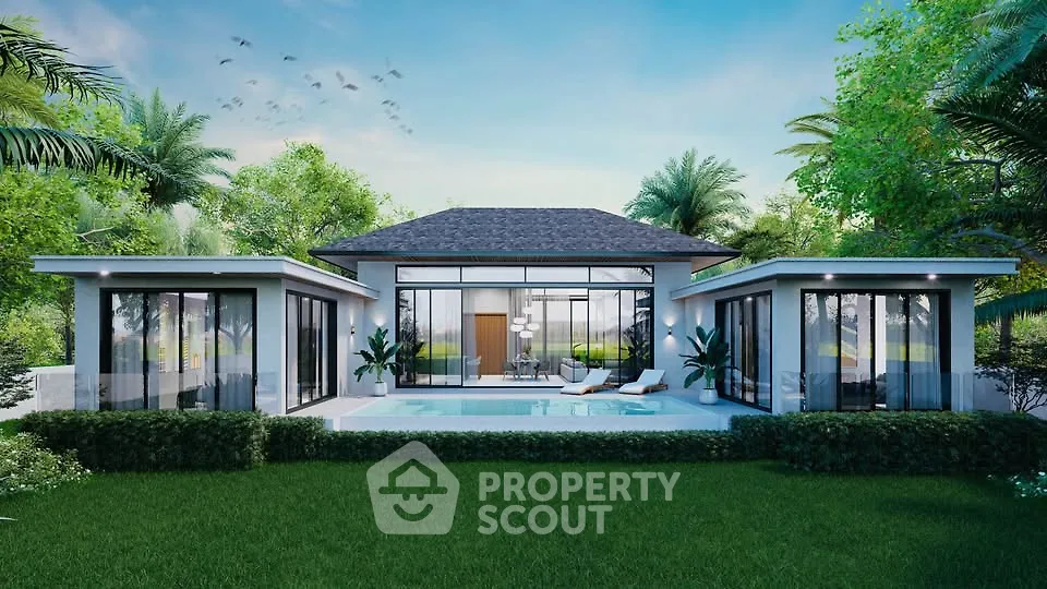 Luxurious modern villa with pool and lush garden, perfect for serene living.