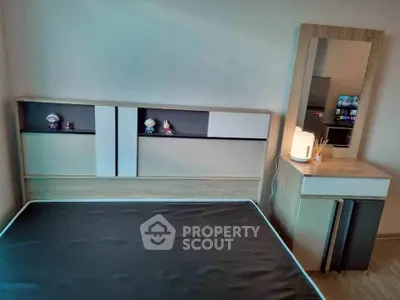 Modern bedroom with sleek furniture and ambient lighting