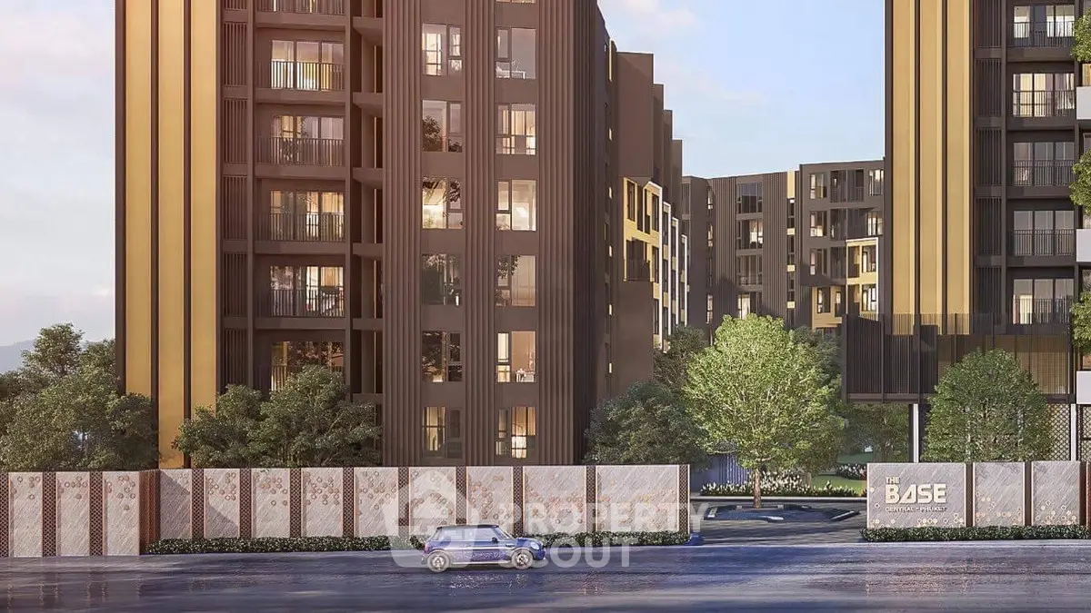 Modern urban apartment complex with sleek architecture and lush greenery.