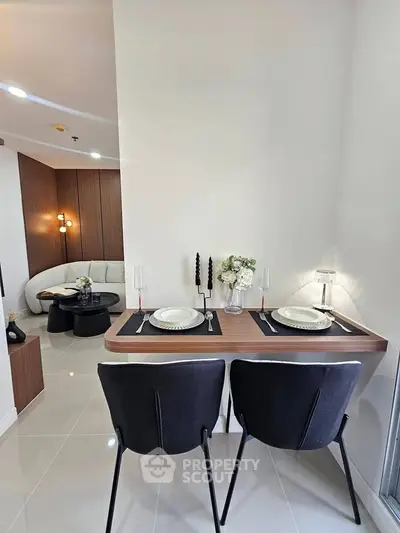 Modern dining nook with elegant table setting in stylish apartment interior