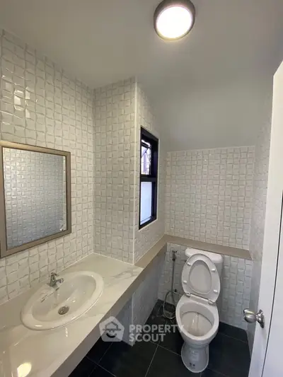 Modern bathroom with sleek design and stylish tile work