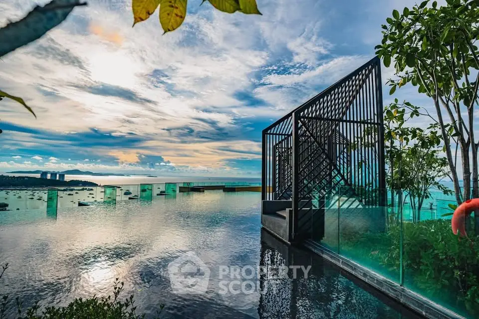 Stunning infinity pool with breathtaking ocean view and modern architectural design.