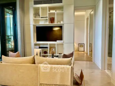 Modern living room with stylish shelving and cozy seating area