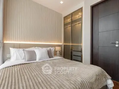 Luxurious modern bedroom with elegant lighting and stylish decor