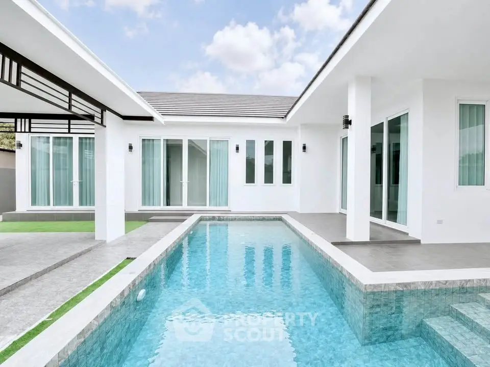Modern luxury villa with sleek pool and minimalist design, perfect for contemporary living.