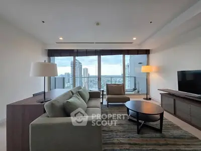 Spacious modern living room with city view and stylish furniture