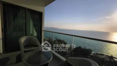 Stunning balcony with ocean view and modern outdoor seating