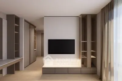Modern living room with built-in TV unit and natural light