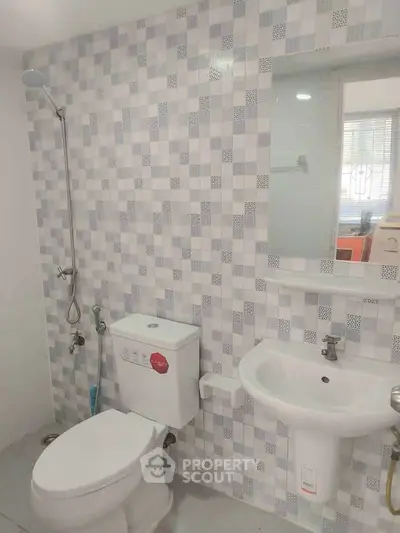 Modern bathroom with stylish tiles and sleek fixtures