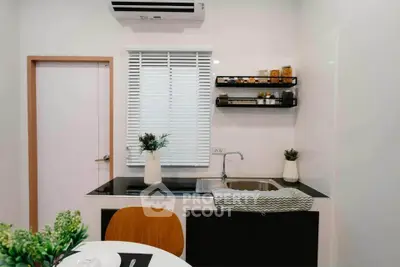 Modern kitchen with sleek design and open shelving