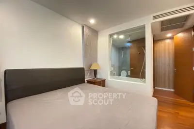 Modern bedroom with ensuite bathroom and stylish decor