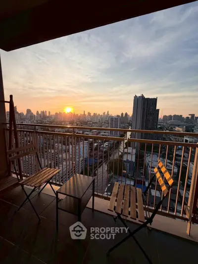 Stunning cityscape view from a high-rise balcony at sunset, perfect for urban living enthusiasts.