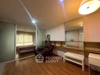 Spacious living room with modern decor and cozy seating area