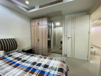 Modern bedroom with stylish decor and spacious layout