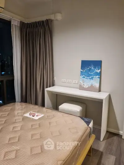 Modern bedroom with stylish decor and city view
