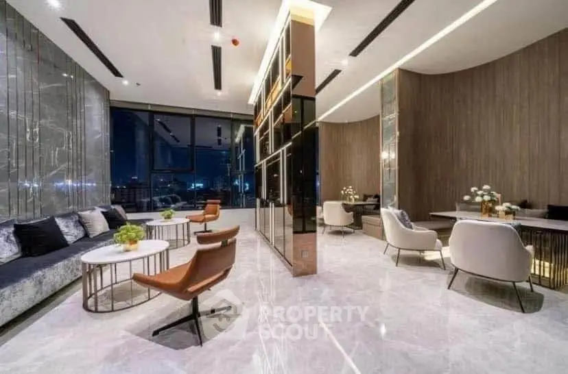 Luxurious modern living room with elegant marble flooring and stylish furniture, offering a stunning city view.