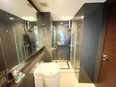 Modern bathroom with sleek design and glass shower enclosure