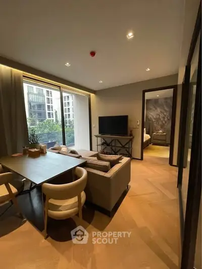 Modern living room with elegant dining area and large window view in luxury apartment.